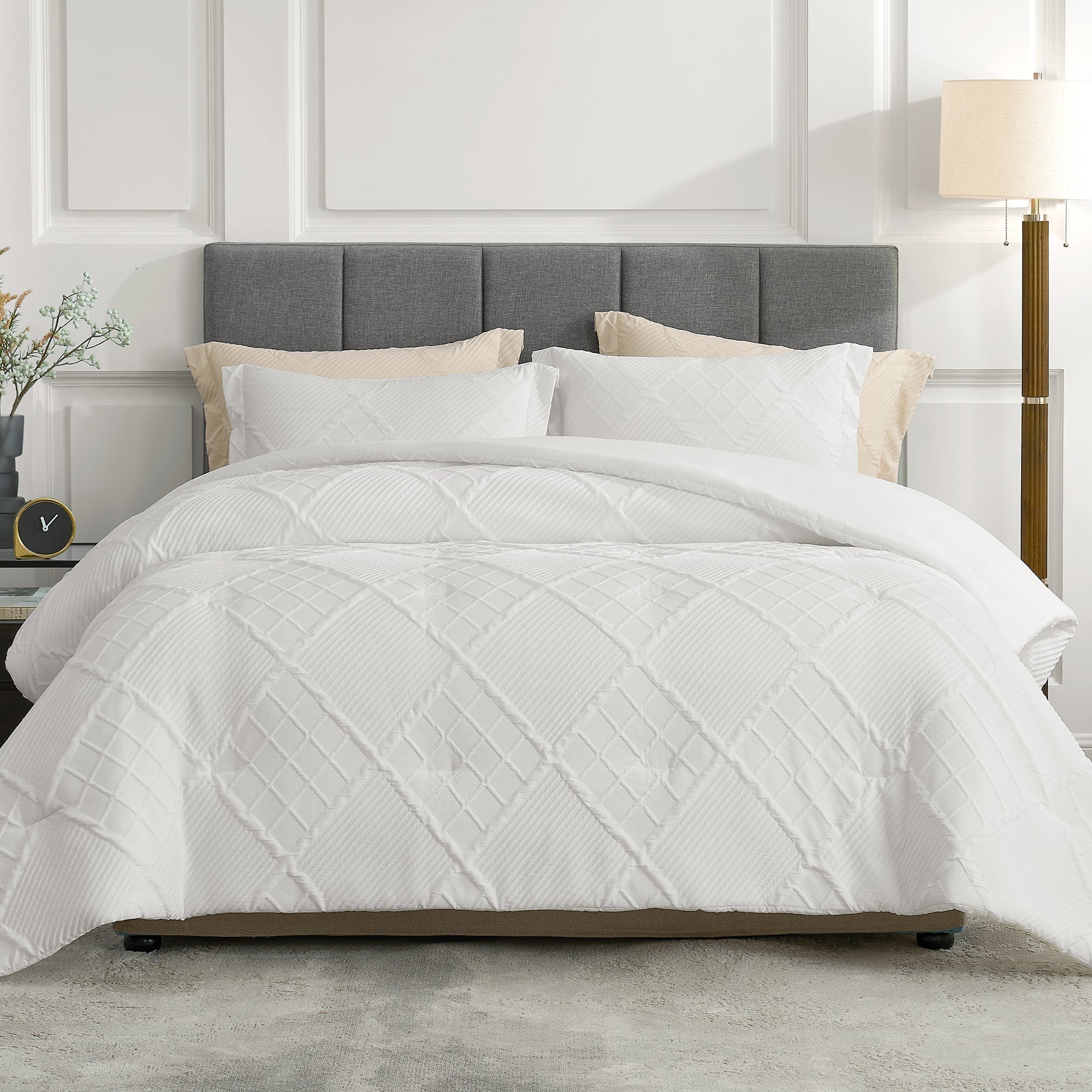 Snuggle Sac All-Season Jacquard Windowpane Comforter Set in off white on bed in a bedroom with plants and furnitures#color_Off White