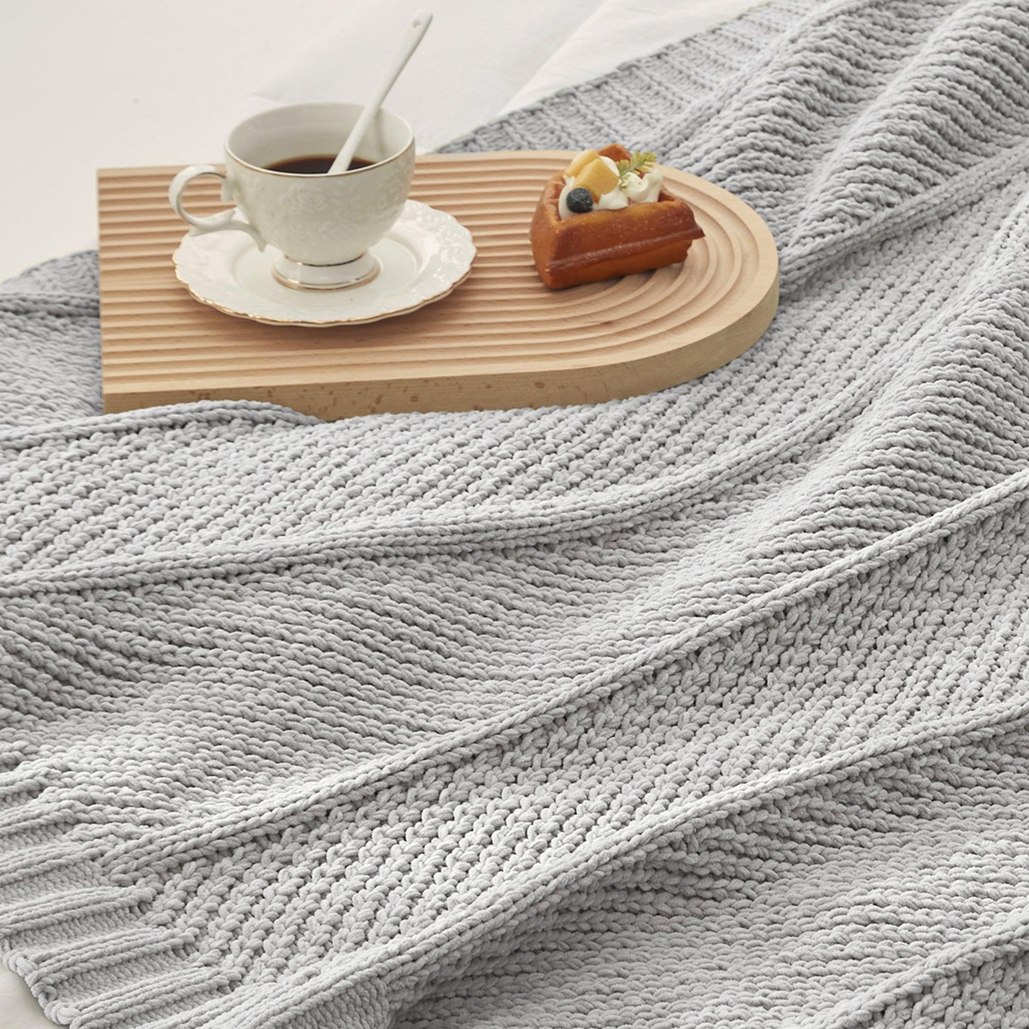 Close up of chevron chenille knit throw blanket in Light Grey showing textured weave #color_Light Grey