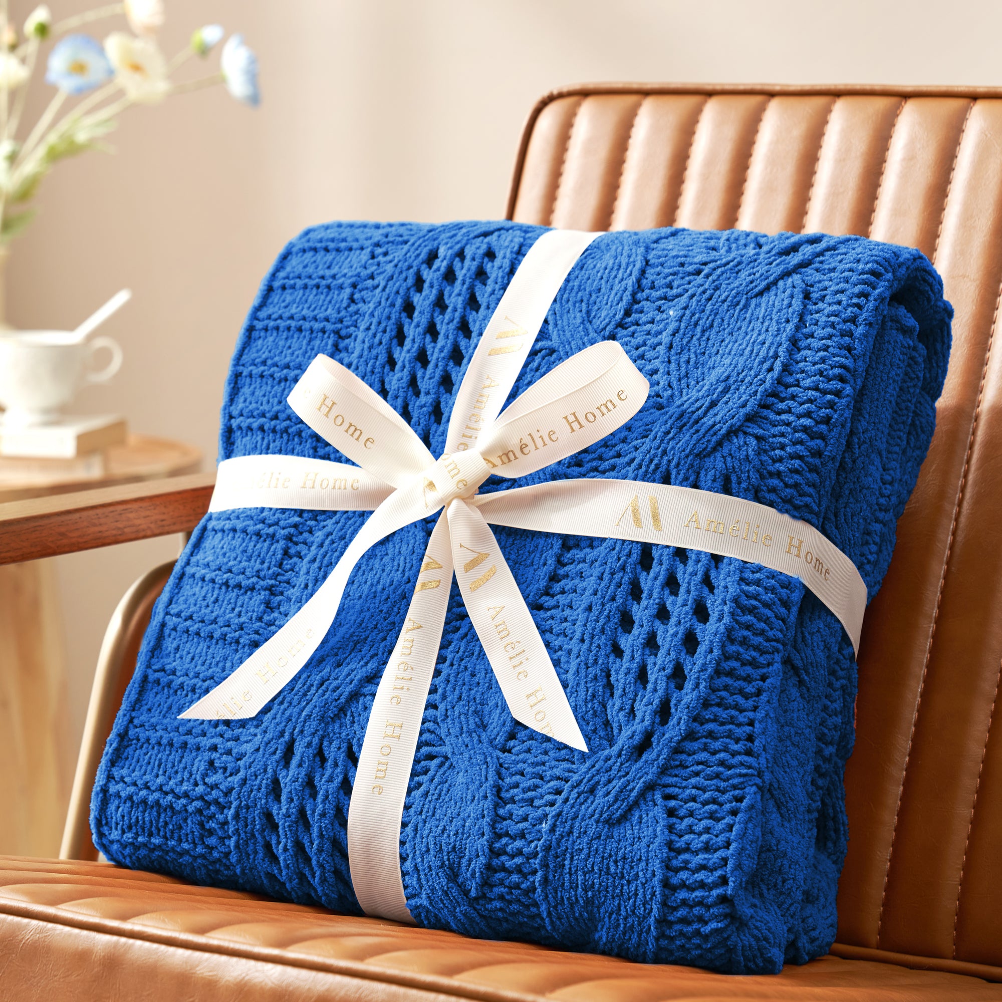 Cable chenille knit throw blanket in Navy Blue folded with ribbon perfect for gifting #color_Navy Blue