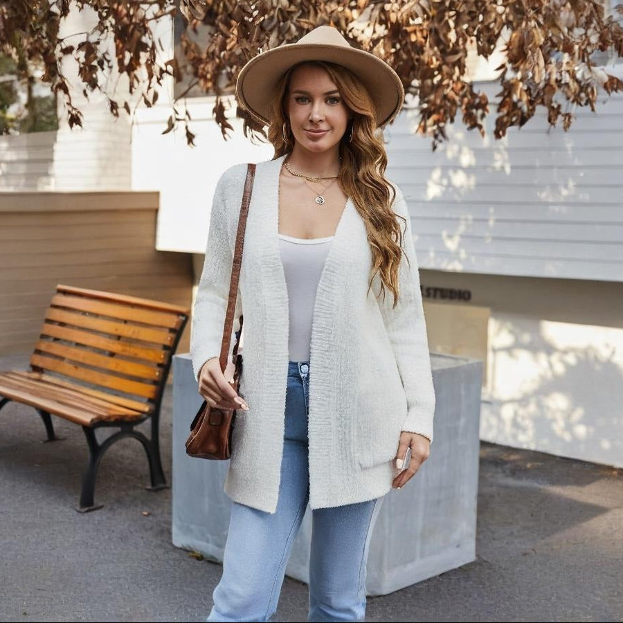 Snuggle Sac women cardigan sweater with pocket in Cream, styled with a cozy and effortless autumn outfit #color_Cream