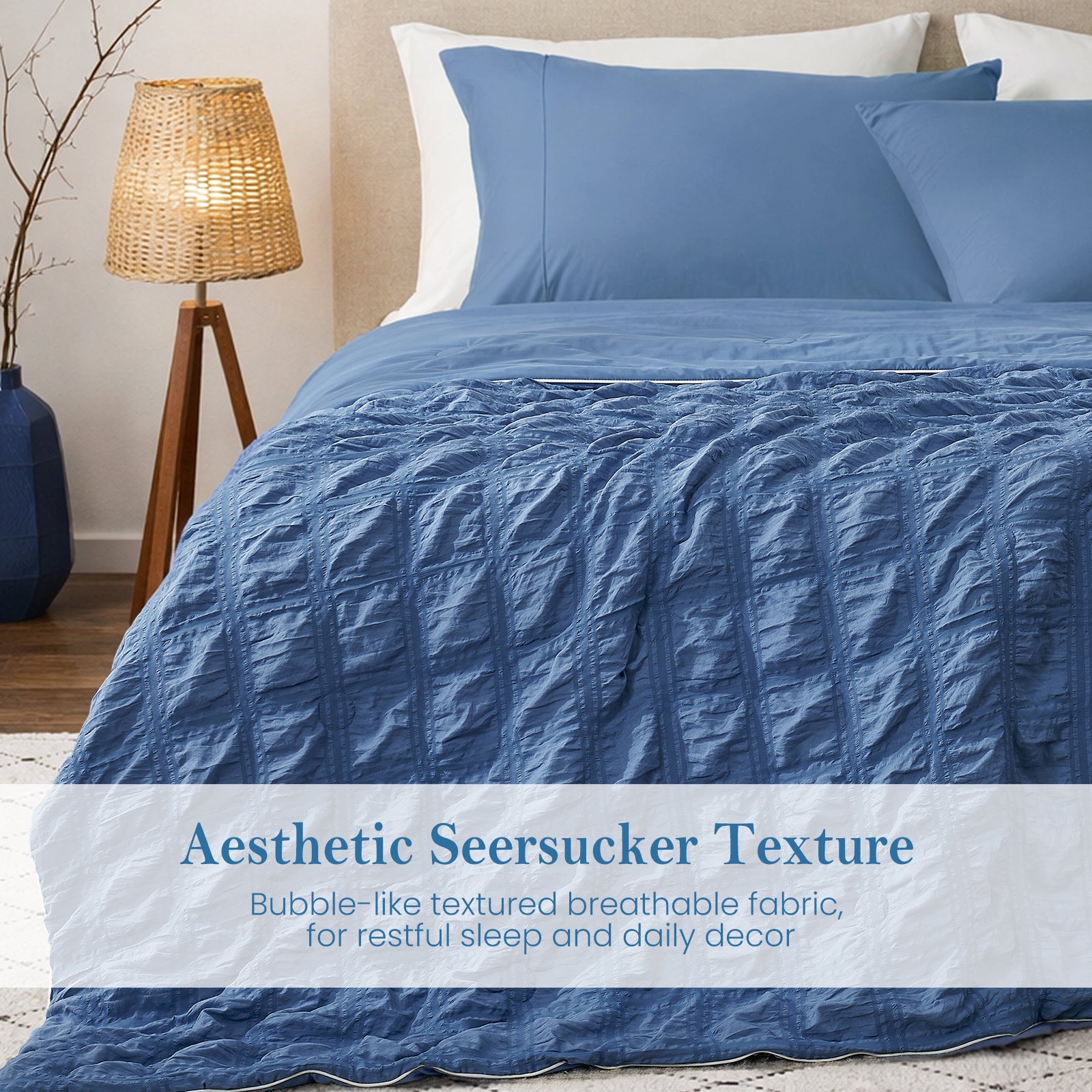Snuggle Sac Cooling comforter set on the bed, featuring aesthetic seersucker texture#color_Dark Blue