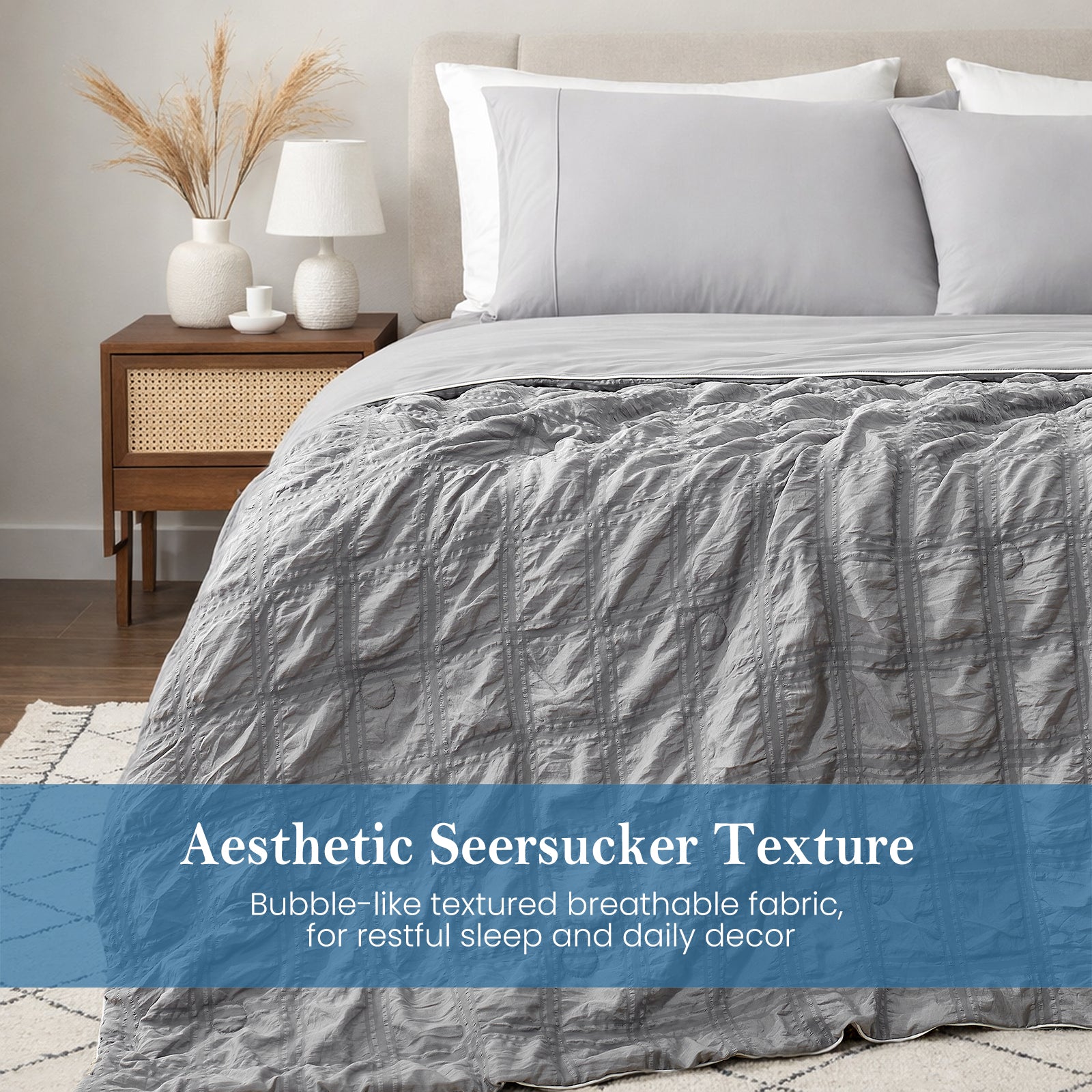 Snuggle Sac Cooling comforter set on the bed, featuring aesthetic seersucker texture#color_Grey