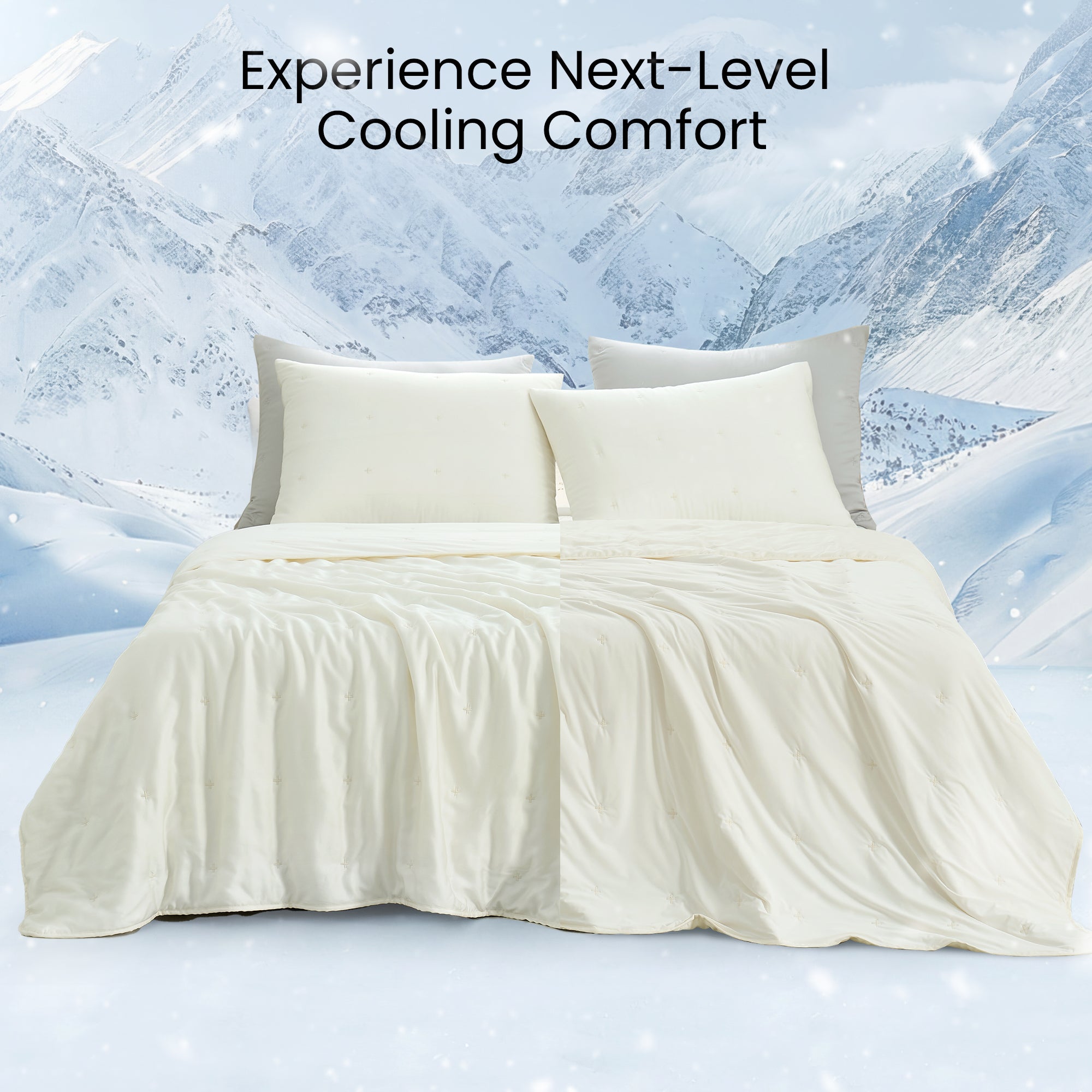 Snuggle Sac Cooling comforter in white on bed in a bedroom with a view of mountains in snow behind#color_White