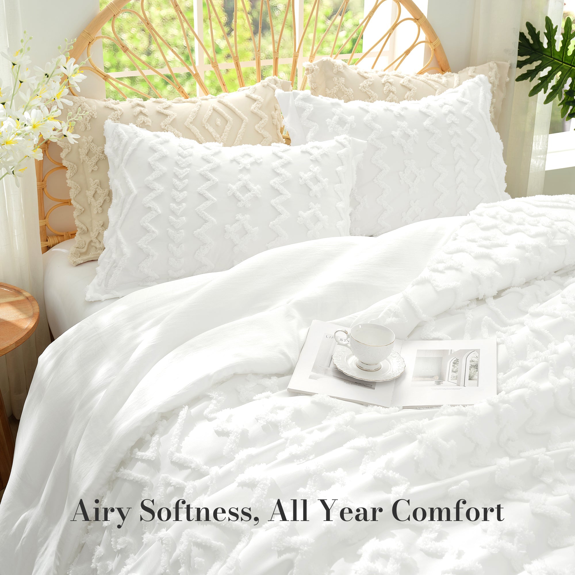 close up of Snuggle Sac All-Season Boho Deluxe Embroidery Comforter Set on bed with tea sets#color_Off White