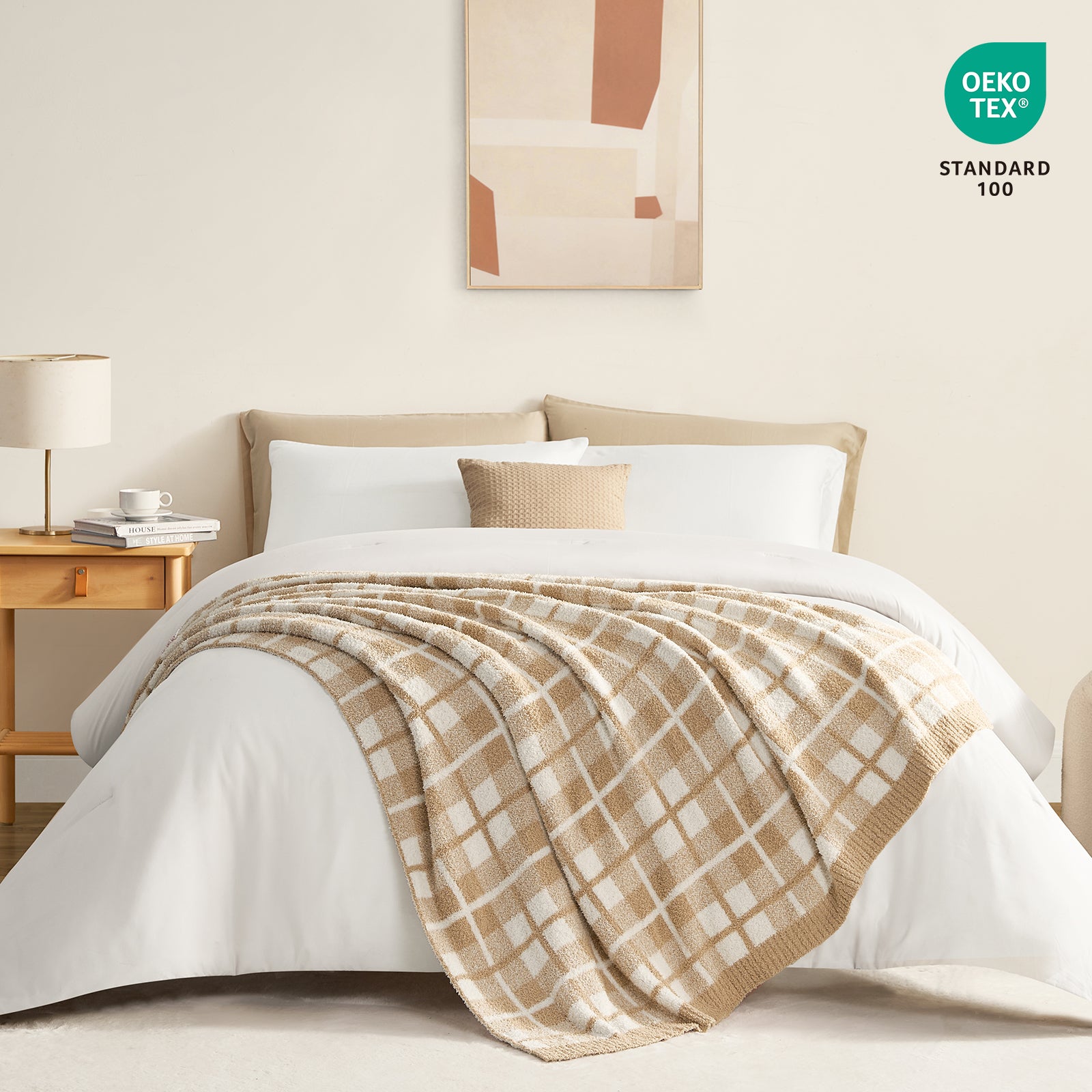 Reversible Buffalo Plaid Feather Yarn Knit Throw Blanket draped over a bed in a bright room with OEKO-TEX Certificate on the top right#Color_Plaid Beige