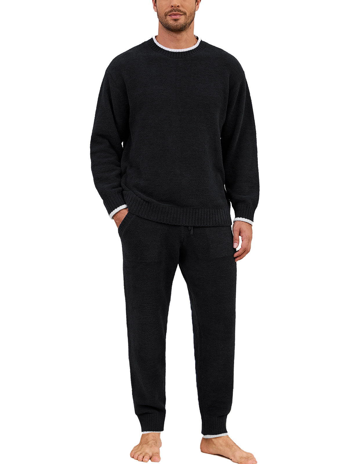 Man wearing a black sweater and pants on a white background #color_Black