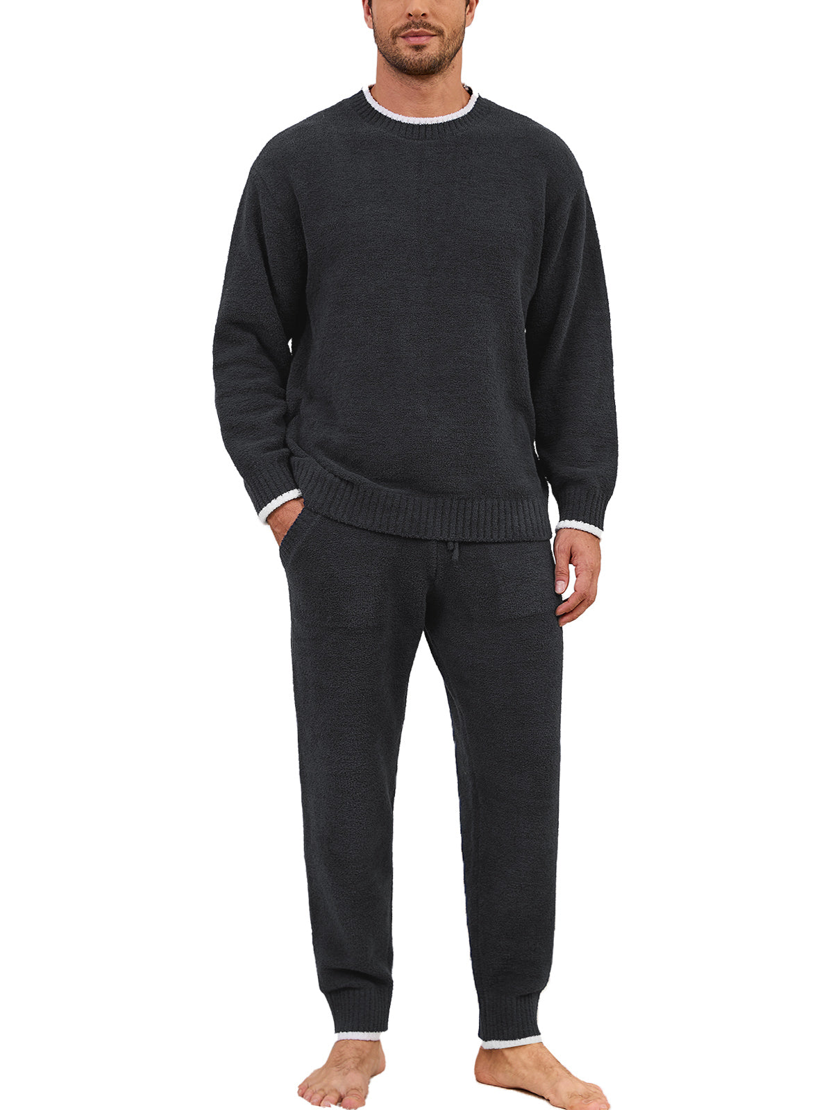 Man wearing a dark gray sweater and matching pants on a white background #color_Dark Grey