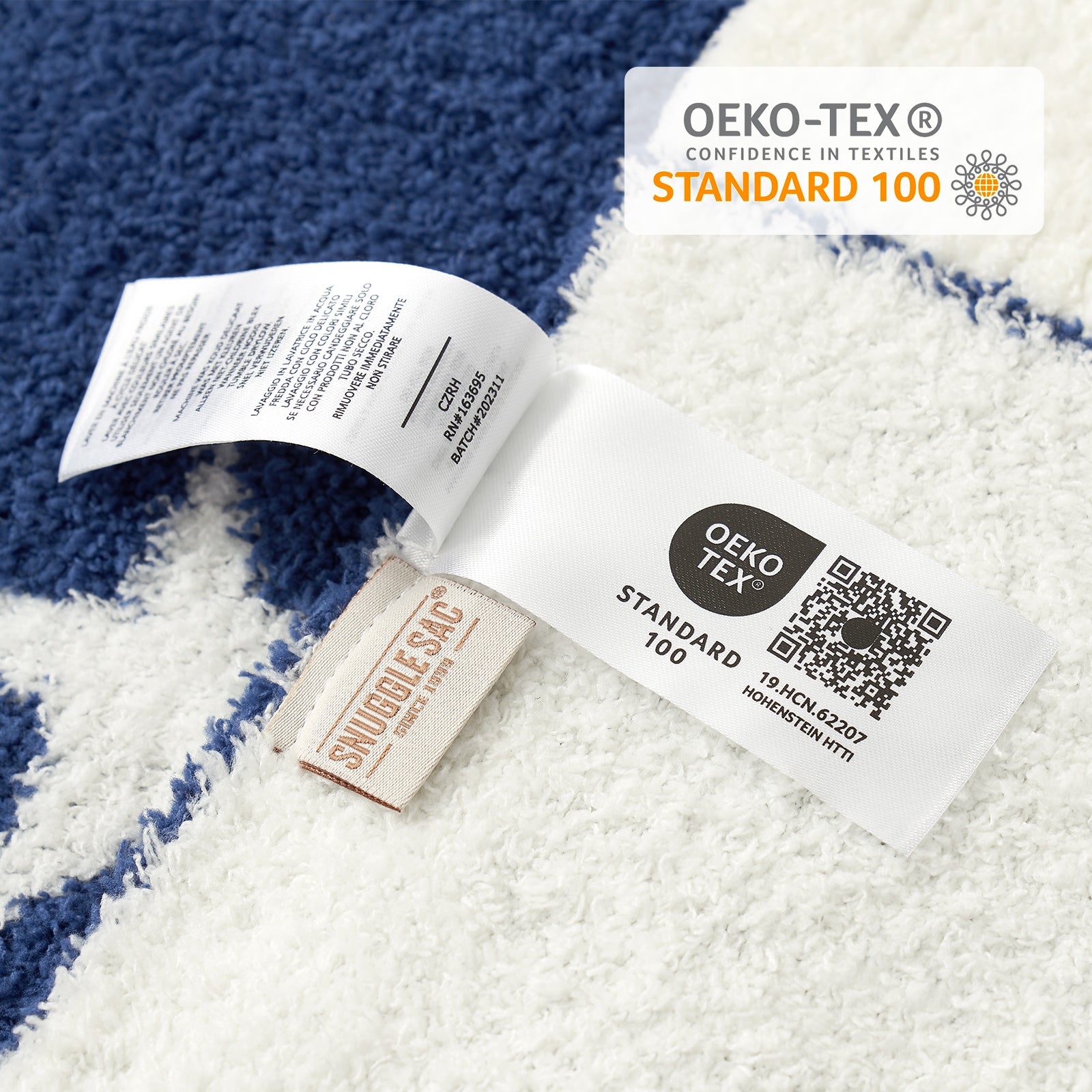 Close up of Snuggle Sacs Reversible Star Feather Yarn Knit Throw Blanket with OEKO-TEX Certificate#color_Royal_Heather_Blue