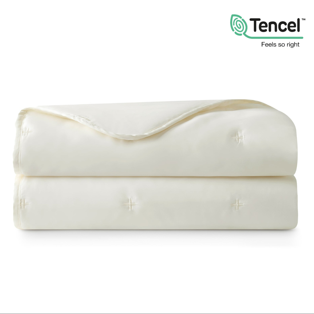 Folded Snuggle Sac Luxurious Tencel™ Lyocell Cooling Comforter#color_White