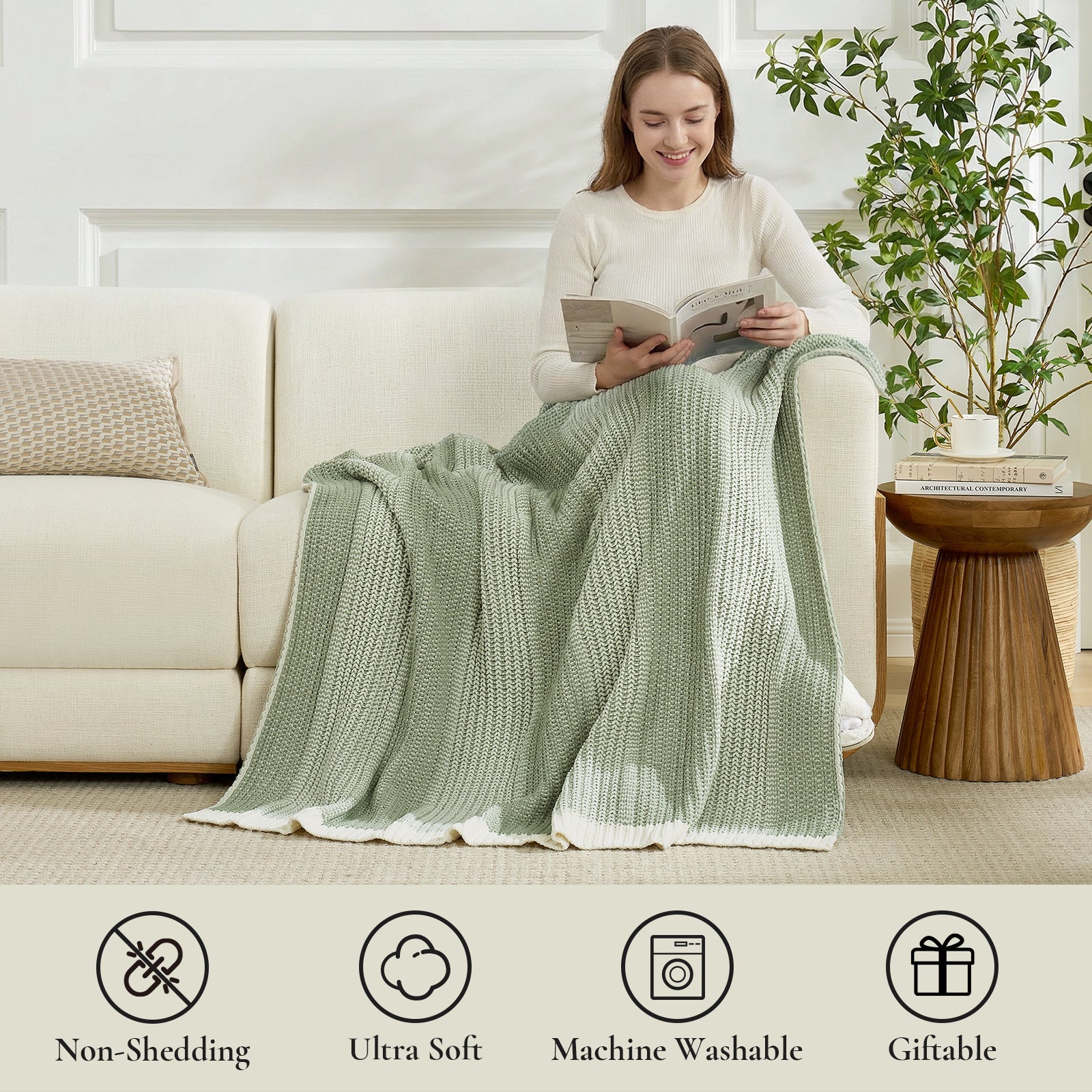 Woman sitting on a couch with a green blanket, reading a book, in a cozy living room setting. #color_Two-tone Green