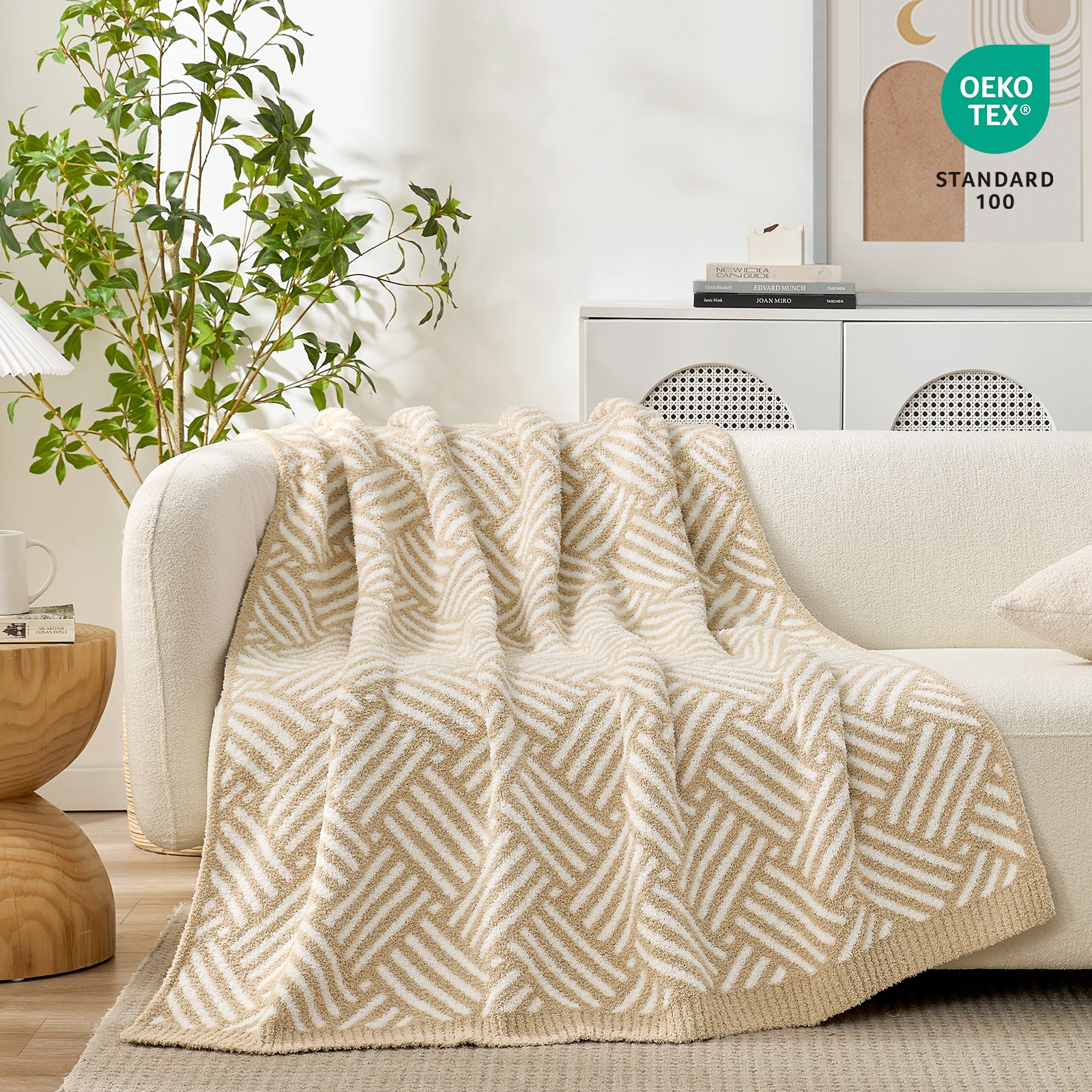 Classic Boho Feather Yarn Knit Throw Blanket on the couch with plant behind#color_Beige