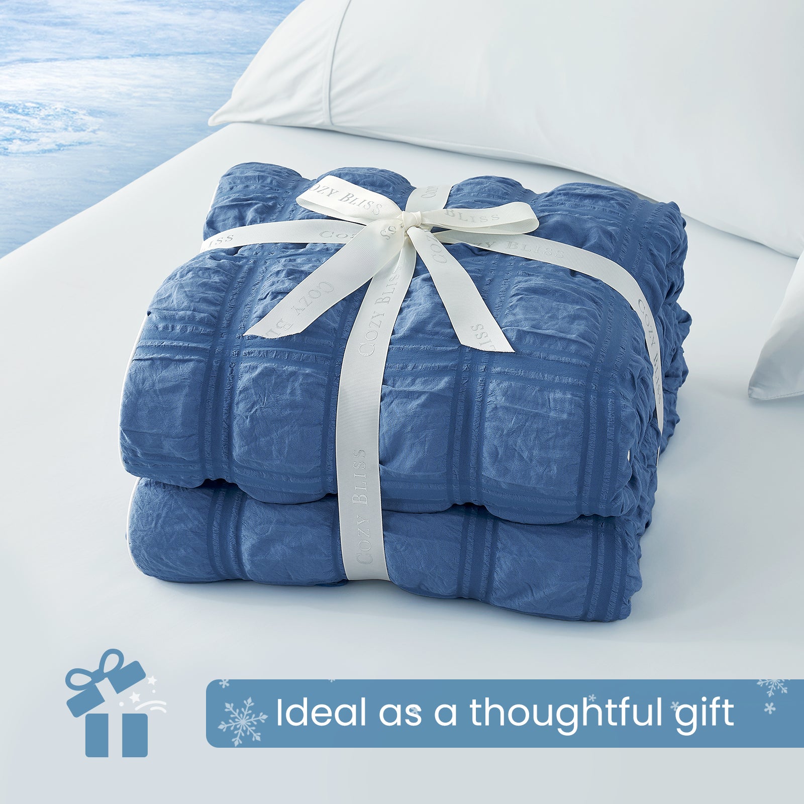 Folded Snuggle Sac dark blue comforter with white ribbon,perfect as gift.#color_Dark Blue