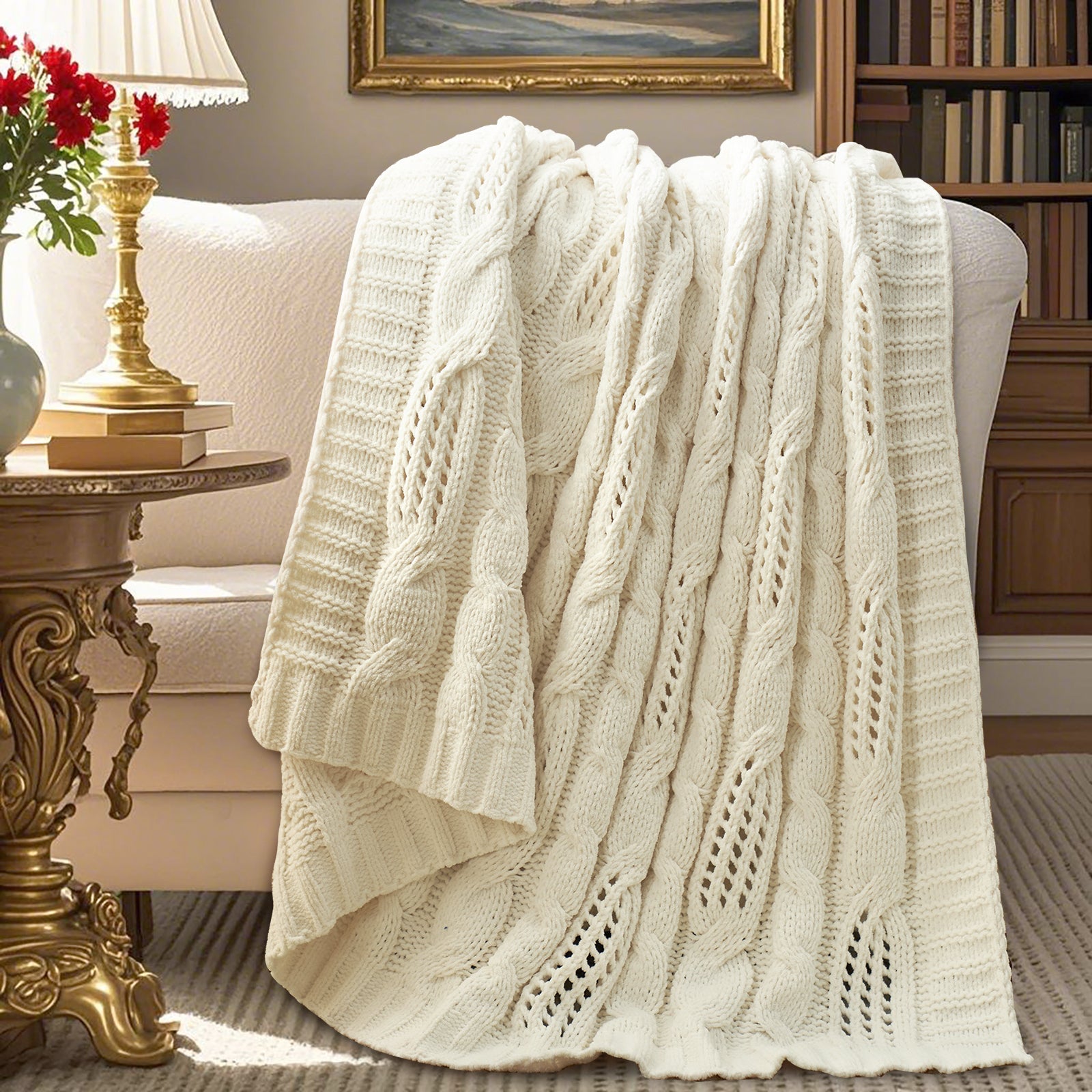 Cable chenille knit throw blanket in Ivory draped over sofa creating an elegant home decor #color_Ivory