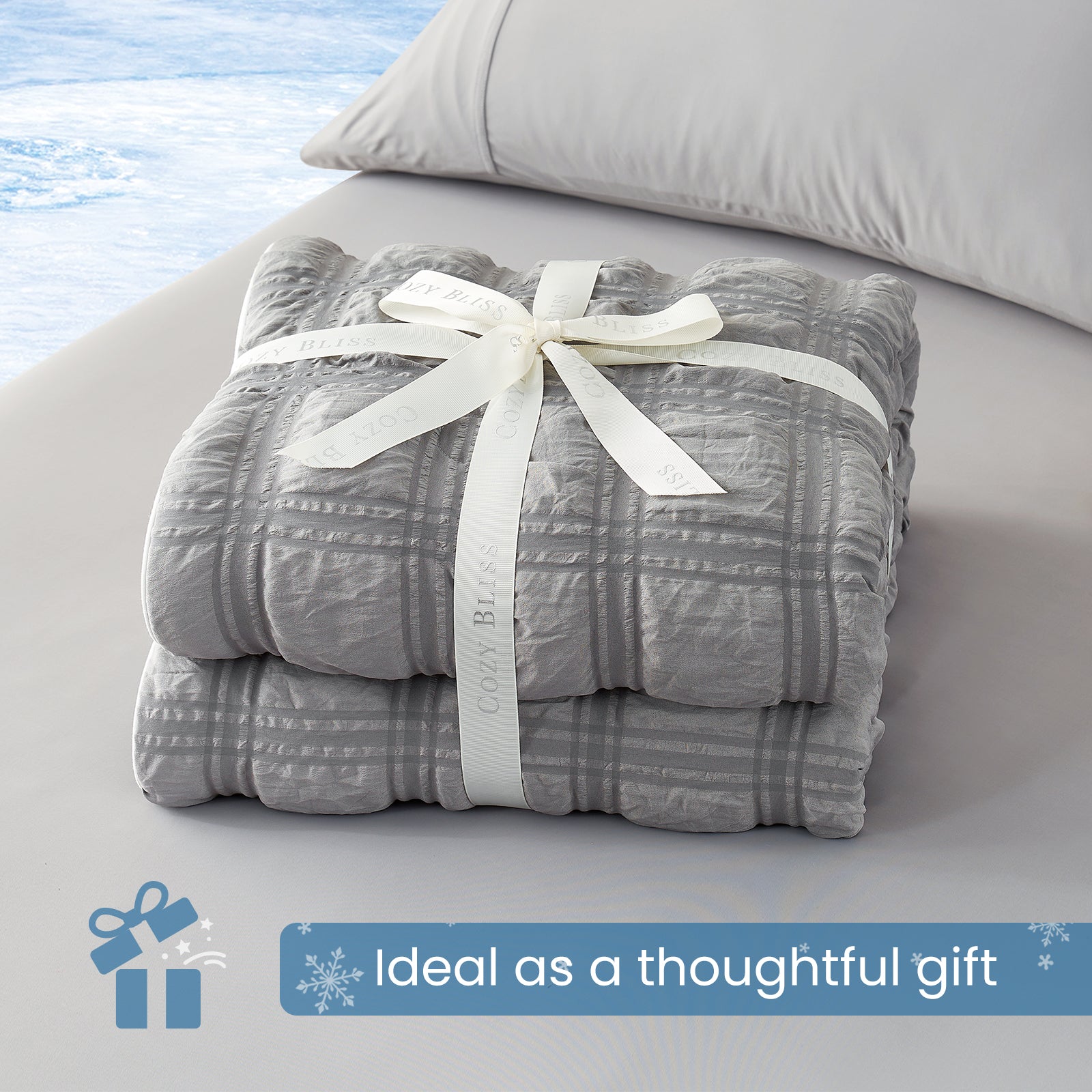 Folded Snuggle Sac grey comforter with white ribbon,perfect as gift.#color_Grey