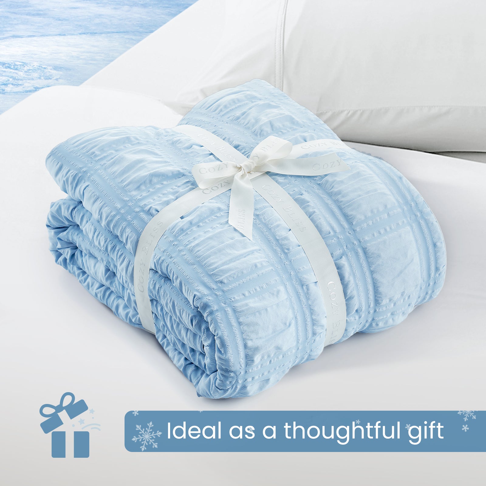 Folded Snuggle Sac blue comforter with white ribbon,perfect as gift.#color_Blue