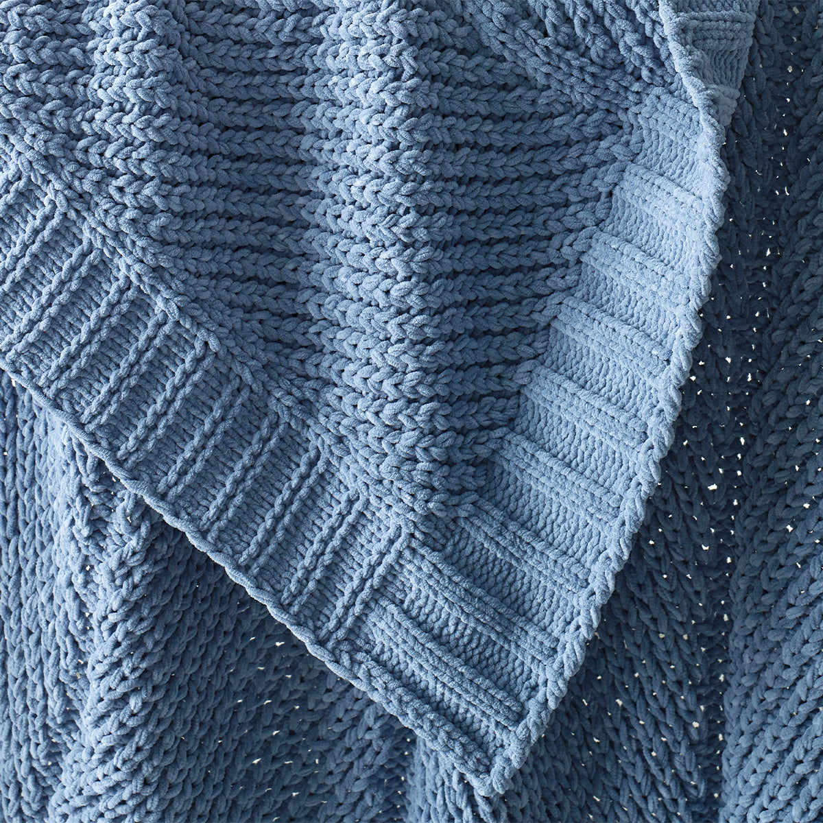 Close up of plush chenille knit loops highlighting soft texture #color_Blue