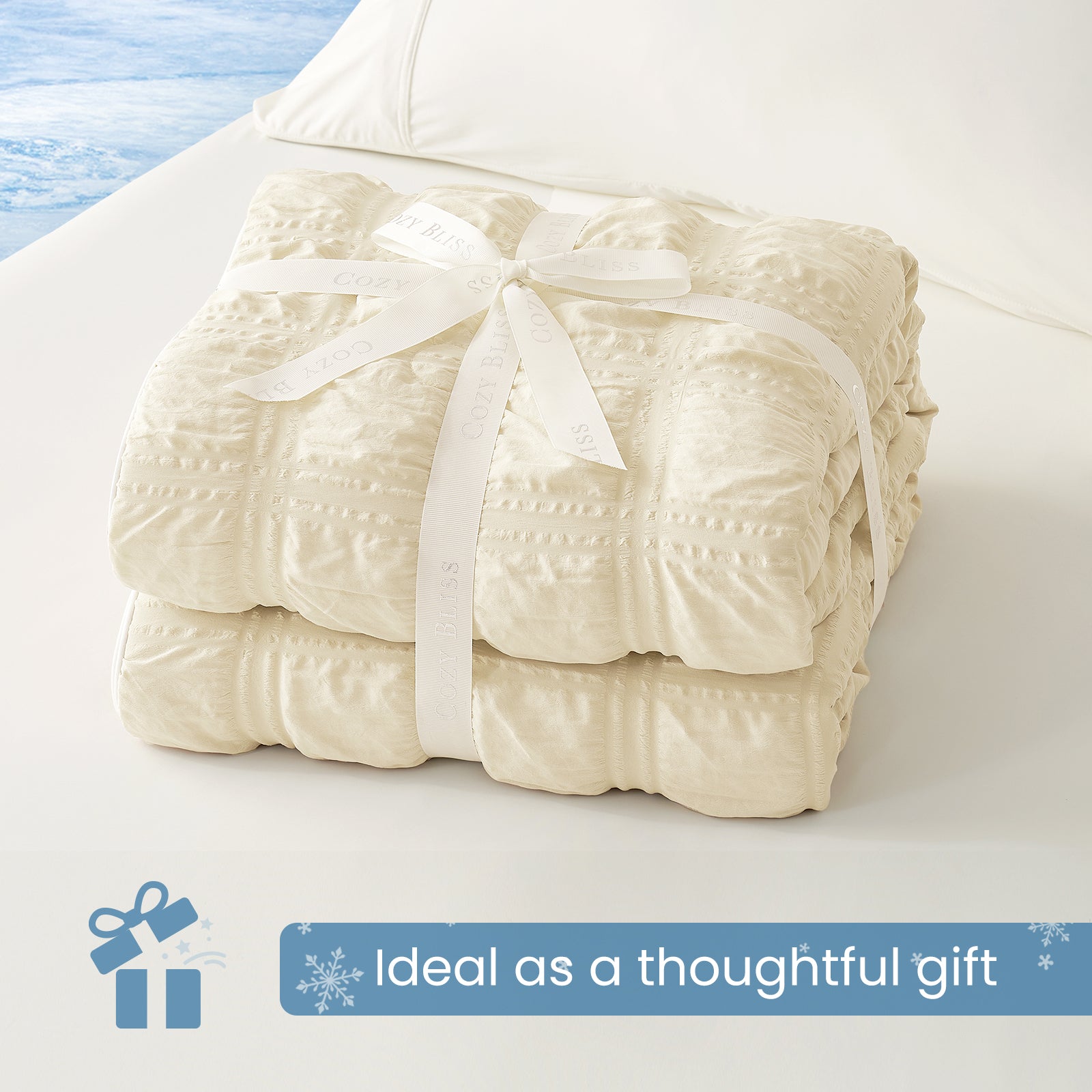 Folded Snuggle Sac khaki comforter with white ribbon,perfect as gift.#color_Khaki
