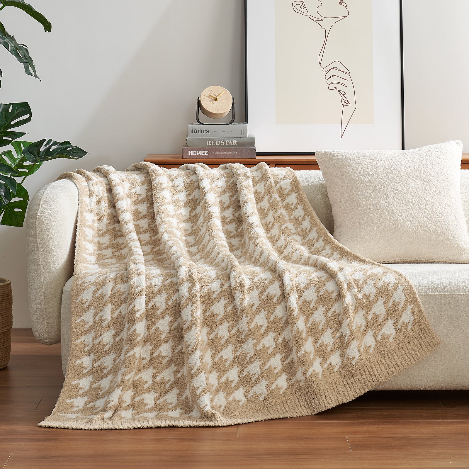 Beige patterned blanket draped over a sofa in a living room setting. #color_Beige