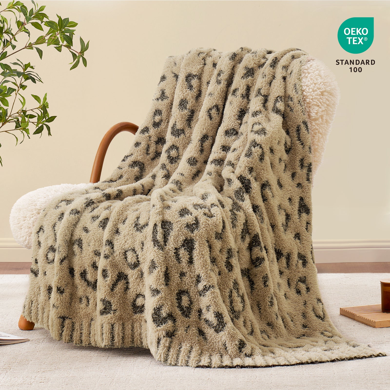 Snuggle Sac leopard faux fur knit throw blanket in Brown Leopard draped over an armchair, creating a cozy and stylish living corner #color_Brown Leopard