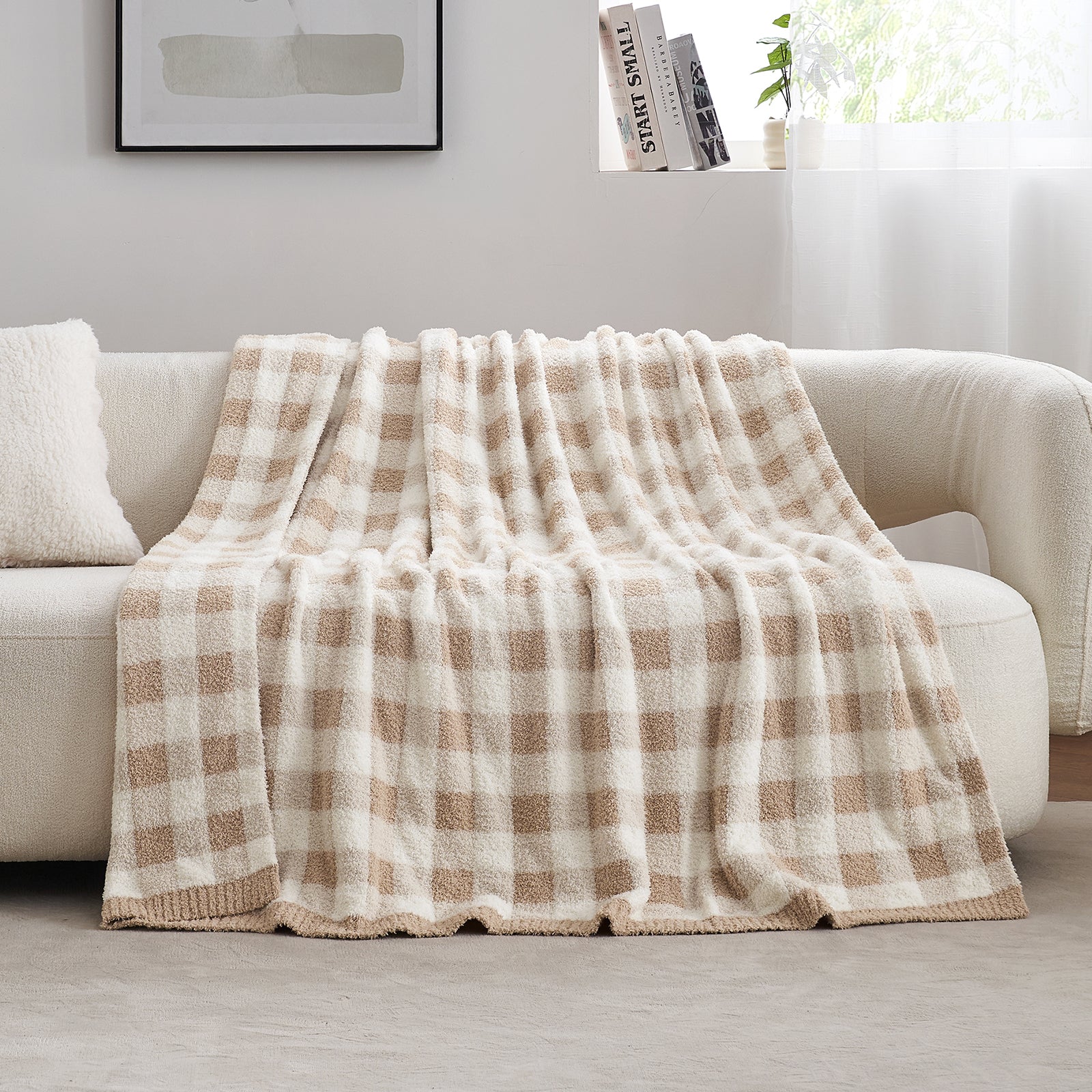 Plaid blanket draped over a sofa in a living room setting #color_Plaid Beige