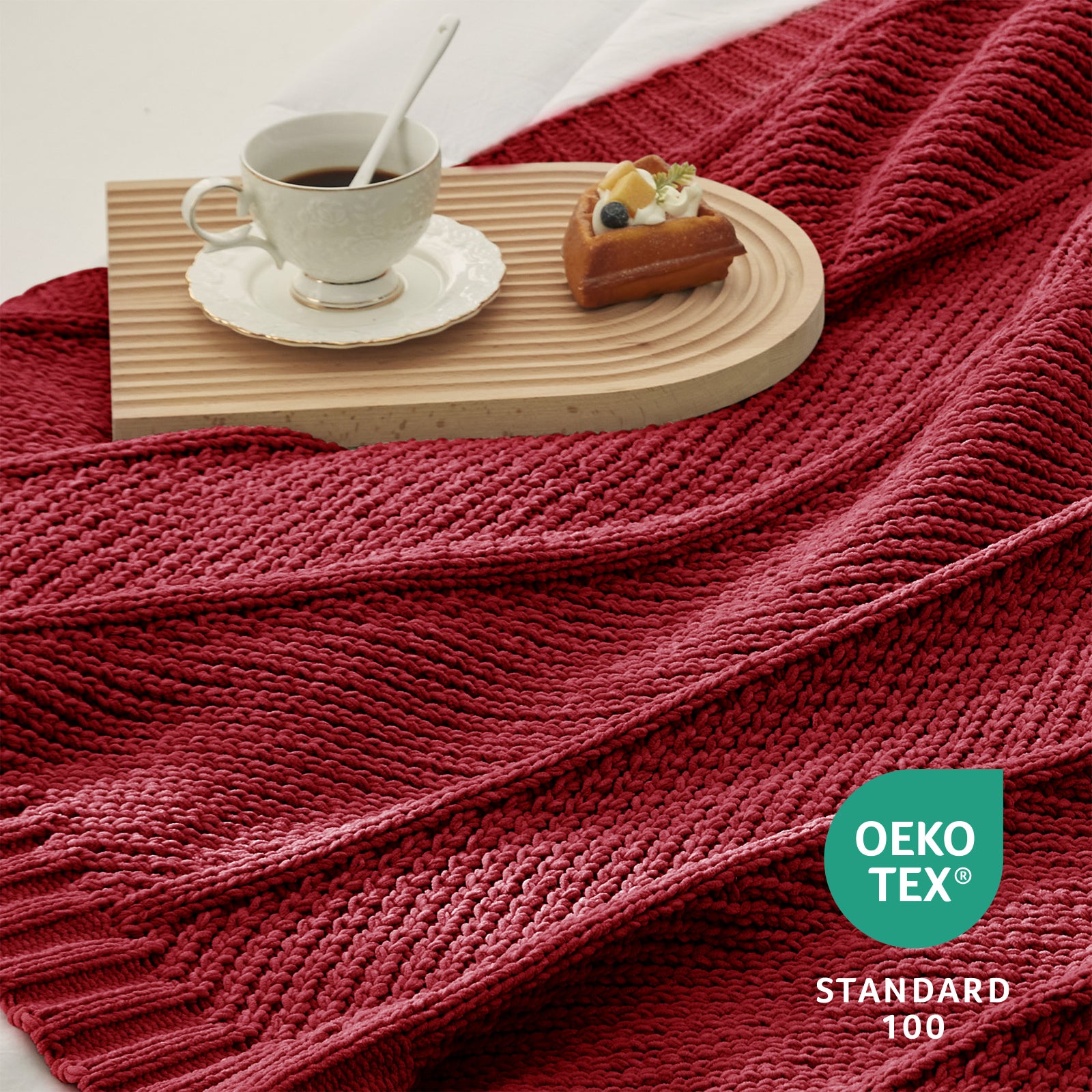 Close up of chevron chenille knit throw blanket in Red showing textured weave and OEKO TEX STANDARD 100 certification #color_Red