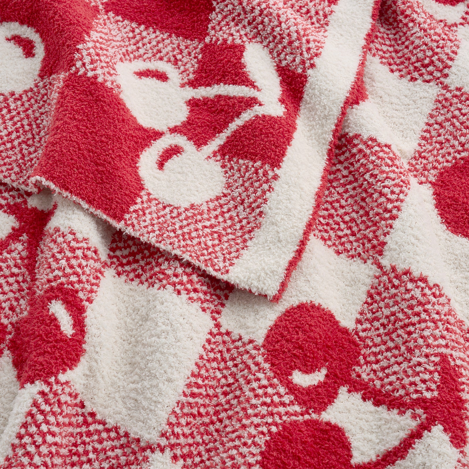 Close up of Snuggle Sacs Red Cherry Feather Yarn Knit Throw Blanket#color_Red_Cherry