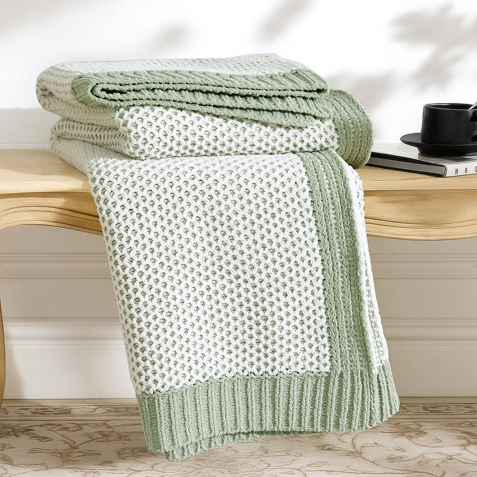Snuggle Sac two tone honeycomb chenille knit throw blanket in Sage Green neatly folded on a wooden table showcasing texture #color_Sage Green