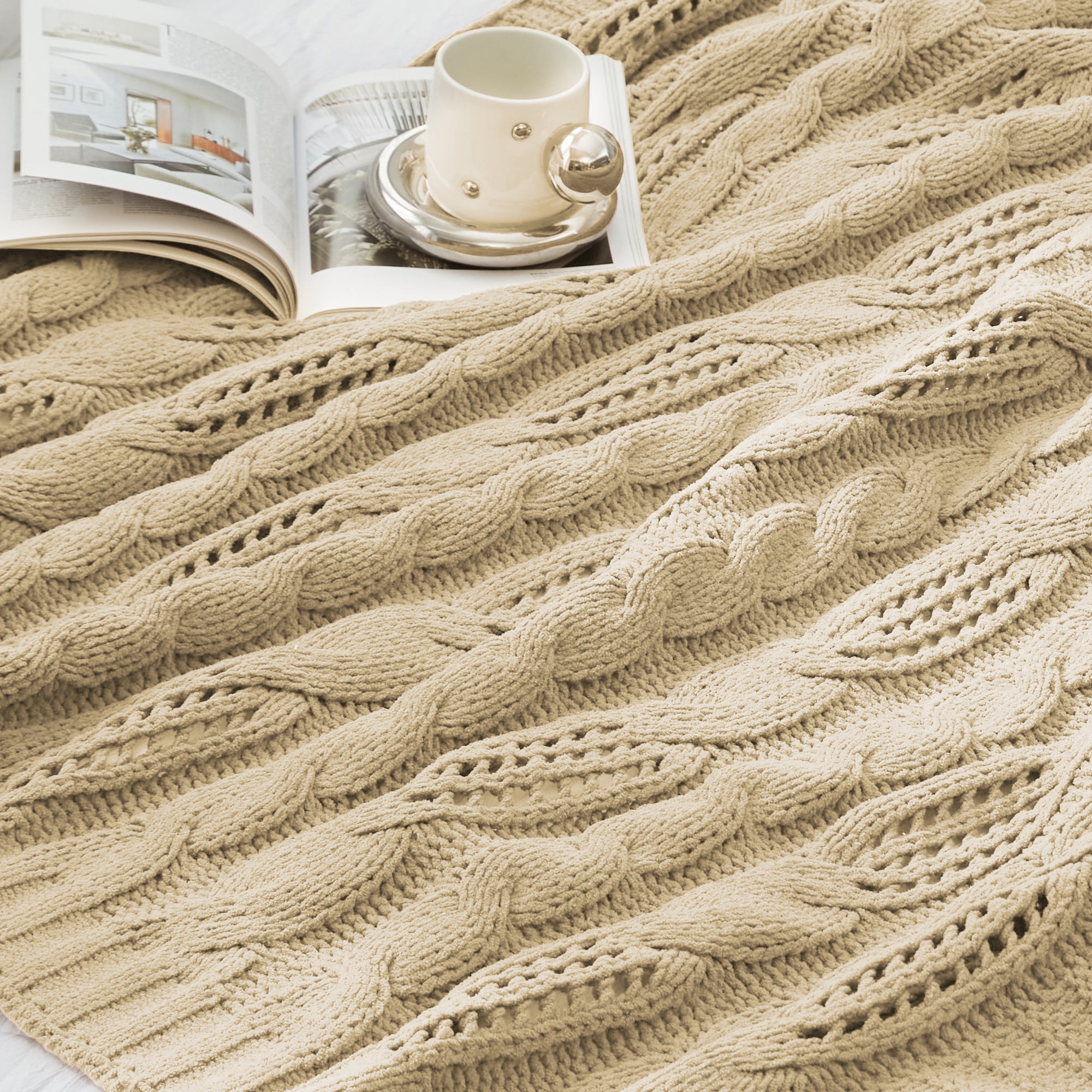 Close up of cable chenille knit throw blanket in Beige showcasing soft cable knit texture #color_Beige