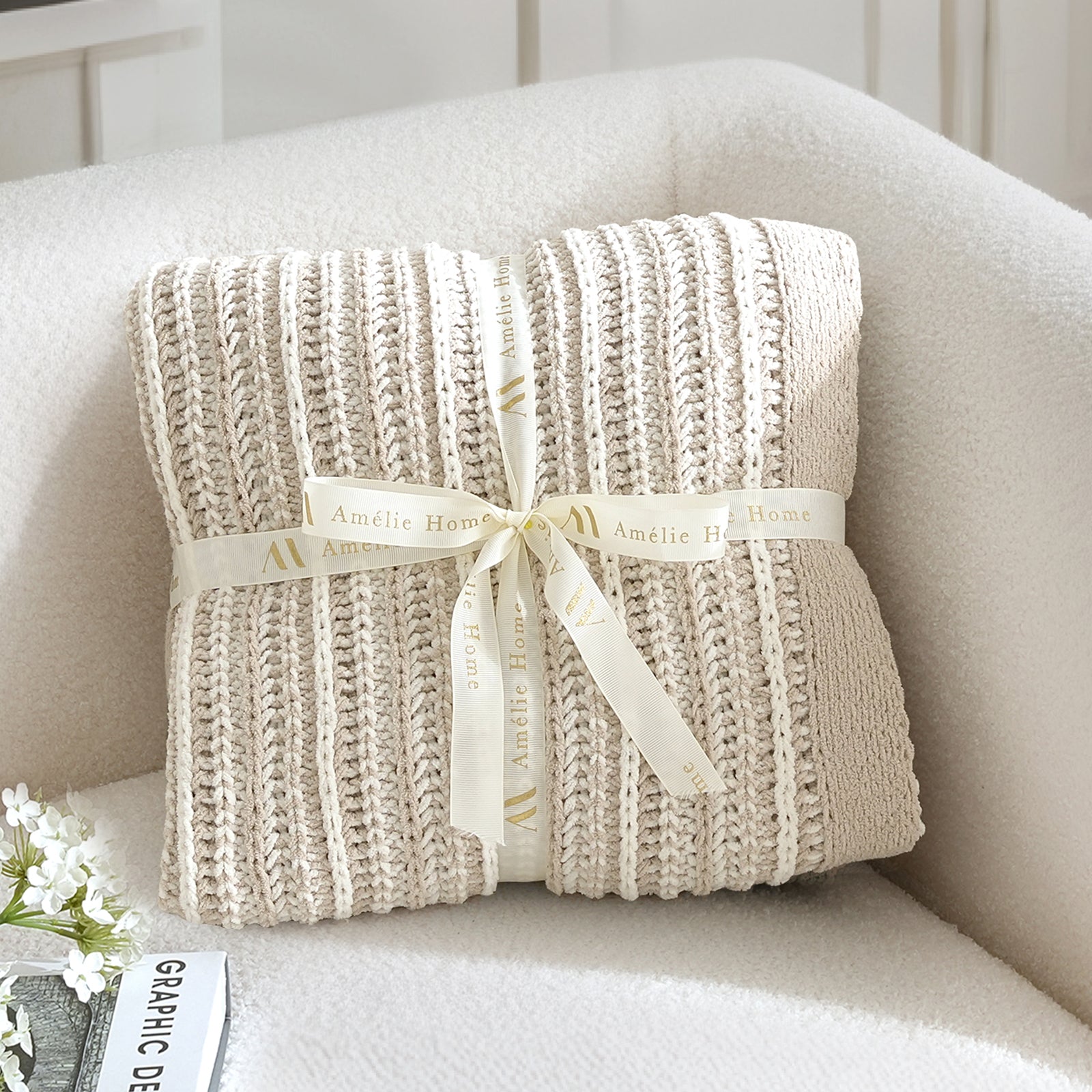 Knitted blanket with a ribbon on a white surface #color_Khaki&White