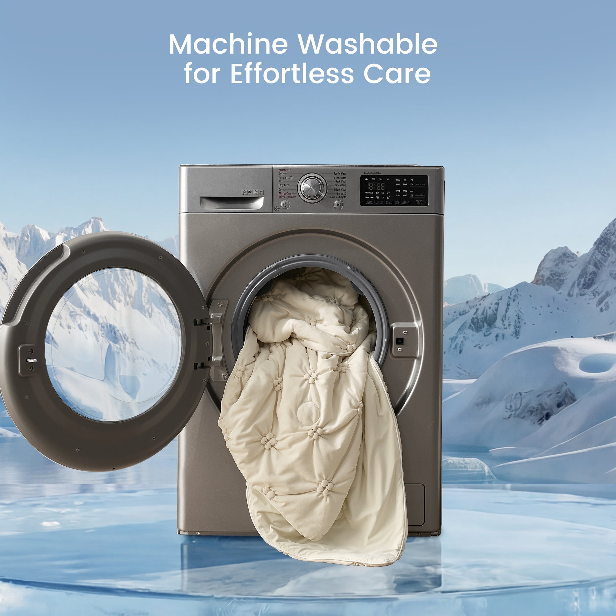 Washing machine with open door showing a comforter inside, set against a snowy mountain landscape.#color_Beige