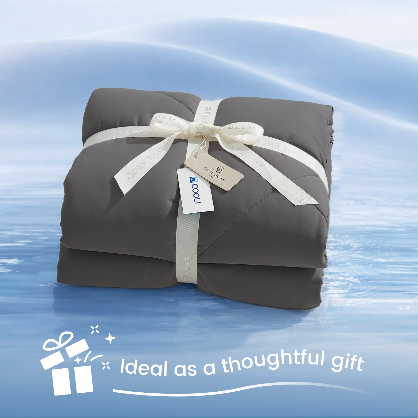 Cozy Bliss Cloud-Like Extra Cooling Comforter in charcoal grey wrapped as a gift, perfect cozy and stylish present.#Color_Charcoal Grey