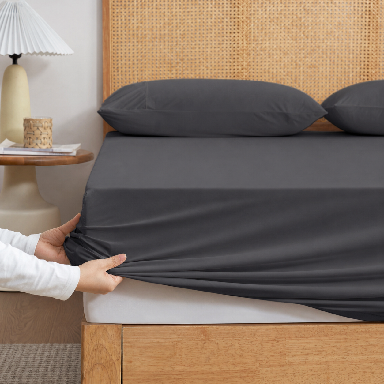 Snuggle Sac Grey-colored cooling fitted sheet set with pillowcases front view. #Color_Charcoal Grey