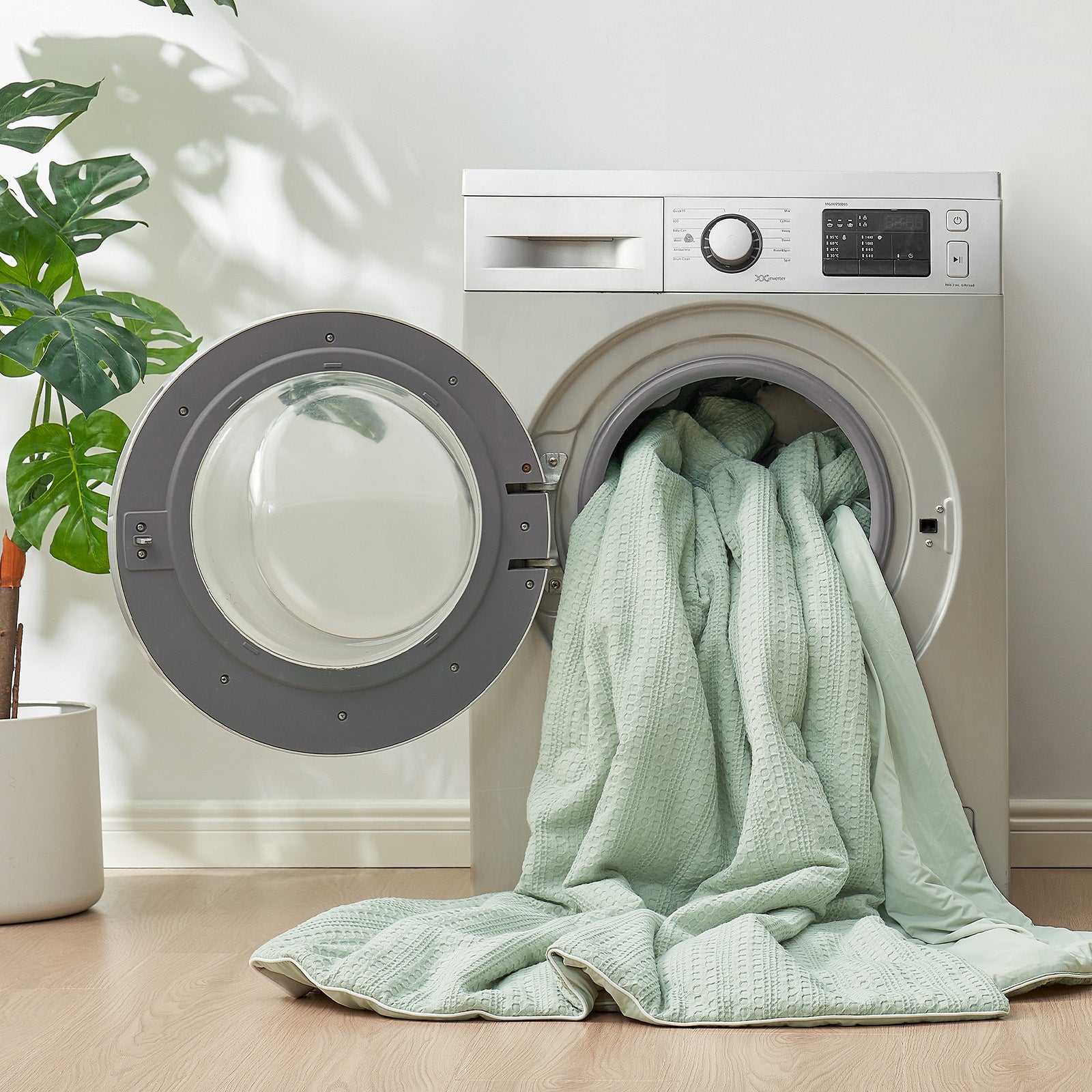 Machine washable Snuggle Sac cooling comforter for easy care in sage green colour#color_Sage Green