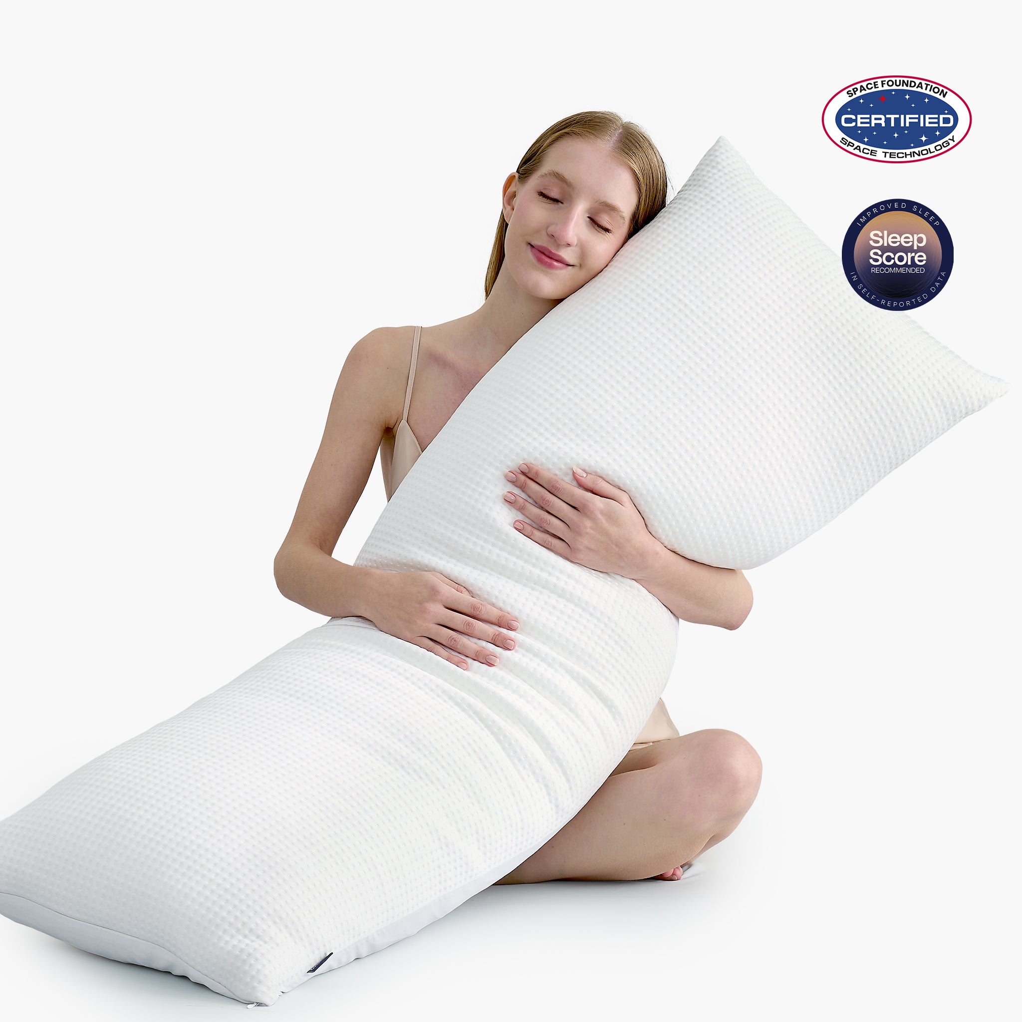 Women hugging body pillow with space station and sleep score certifications. #color_White
