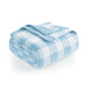 Folded checkered blanket with blue and white pattern on a white background #color_Ice Blue