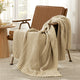 Chevron chenille knit throw blanket in Beige casually draped over a chair in a cozy setting #color_Beige