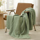 Snuggle Sac chevron chenille knit throw blanket in Sage Green casually draped over a chair in a cozy setting #color_Sage Green