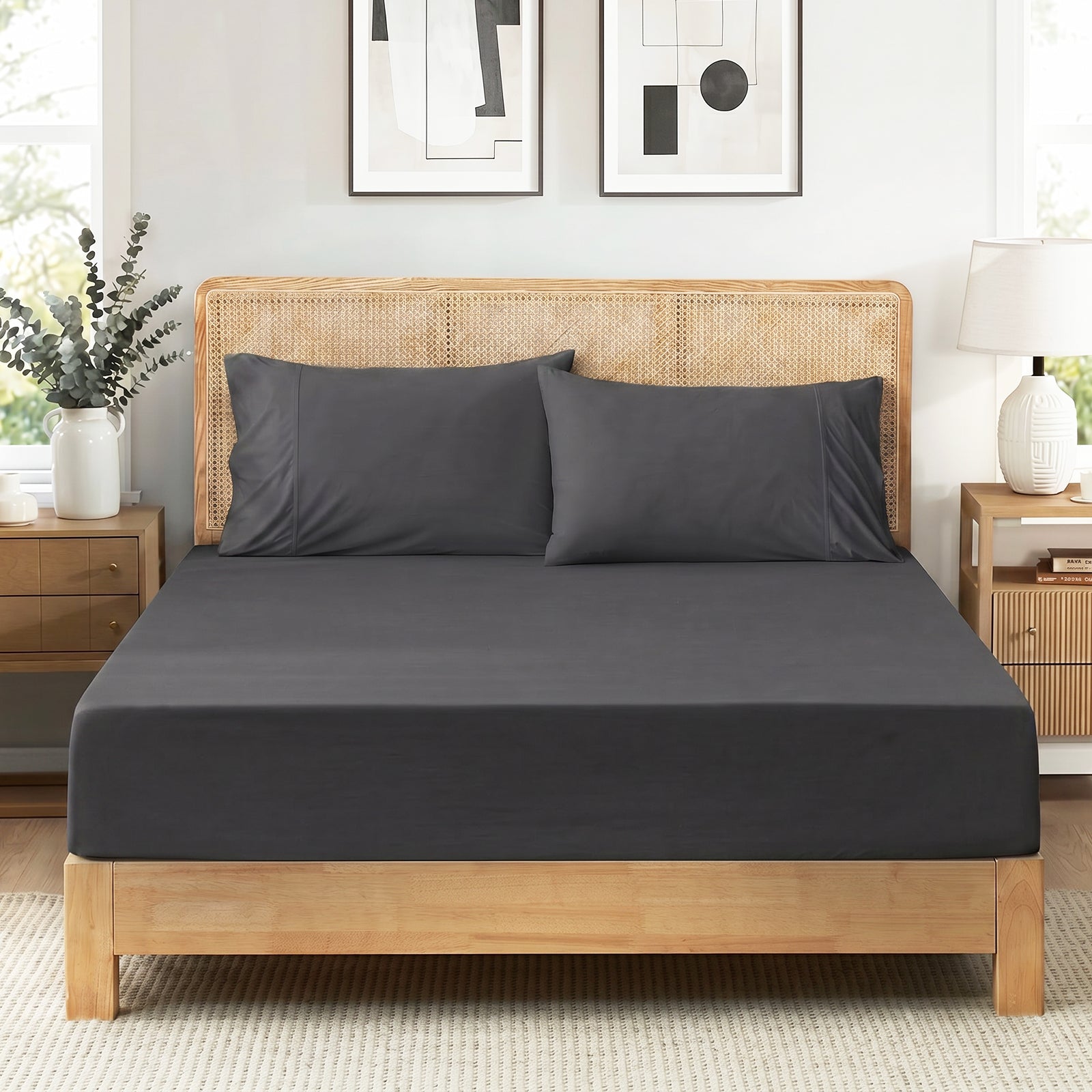 Charcoal gray Snuggle Sac sheet set in front view.#color_Charcoal Grey