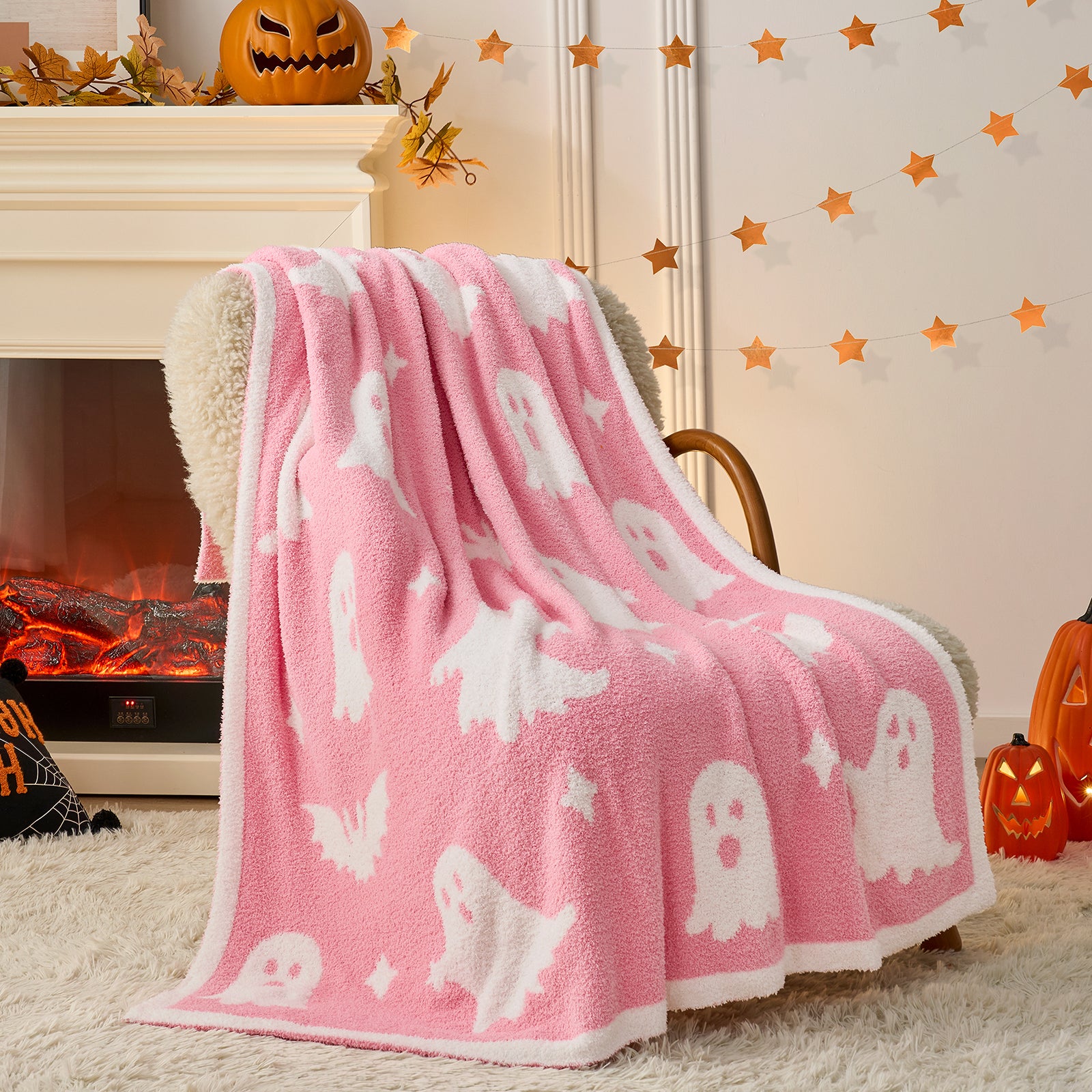 Reversible pink ghost throw blanket