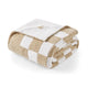 Folded checkered blanket with beige and white pattern on a white background #color_Checkered Beige