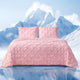 Snuggle Sac Cooling comforter in pink on bed in a bedroom with mountains in snow as a view behind#color_Pink