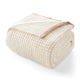 Folded Soft Waffle Feather Yarn Knit Throw Blanket with a white background #Color_Cream