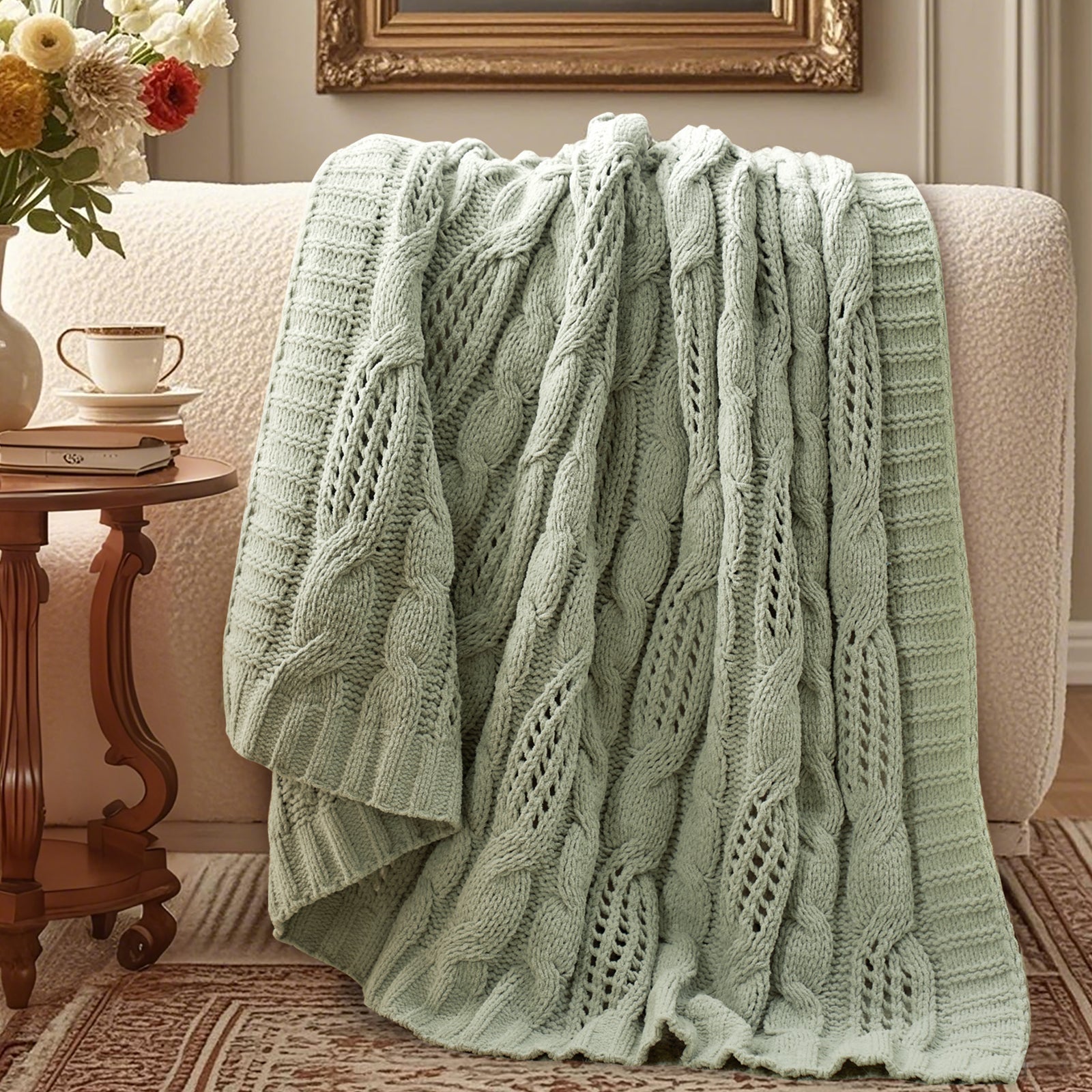 Cable chenille knit throw blanket in Sage Green draped over sofa creating an elegant home decor #color_Sage Green