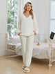 Snuggle Sac women long sleeve V-neck knit loungewear set in Ivory, styled in a cozy indoor lifestyle setting with a relaxed fit #color_Ivory