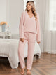 Snuggle Sac women long sleeve V-neck knit loungewear set in Pink, styled in a cozy indoor lifestyle setting with a relaxed fit #color_Pink