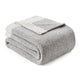 Folded Snuggle Sac Heather Feather Yarn Grey Knit Throw Blanket front view #color_Grey