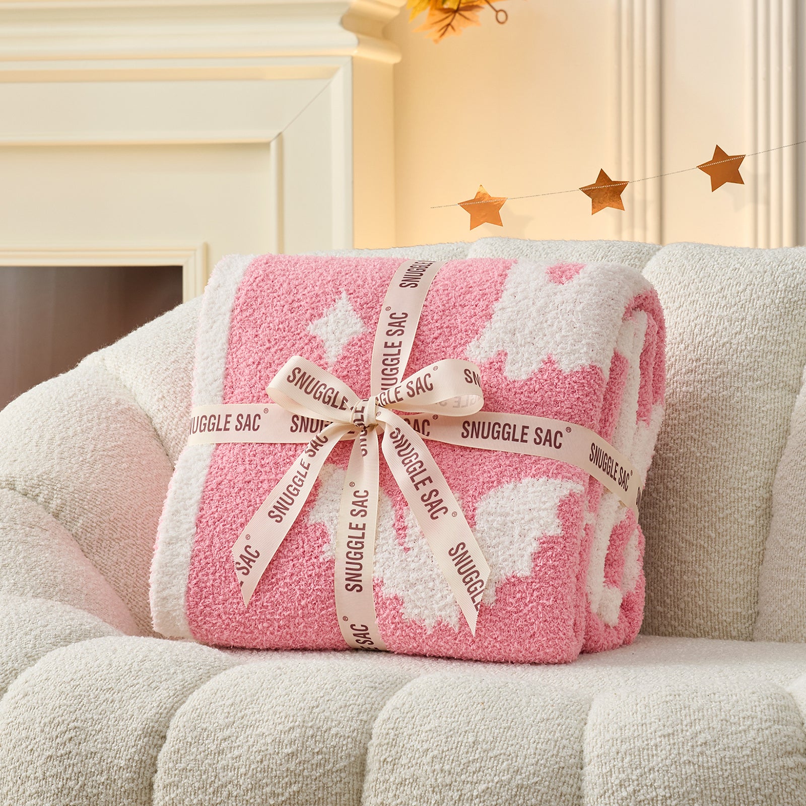 Reversible pink ghost throw blanket