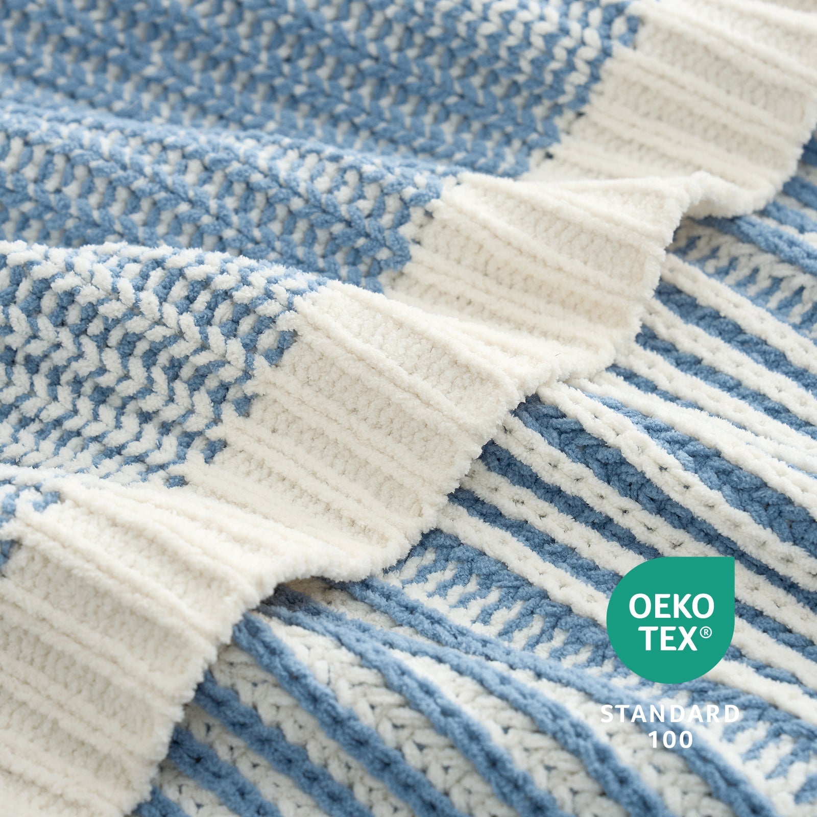 Close-up of blue and white textured fabric with OEKO-TEX Standard 100 logo. #color_Two-tone Blue