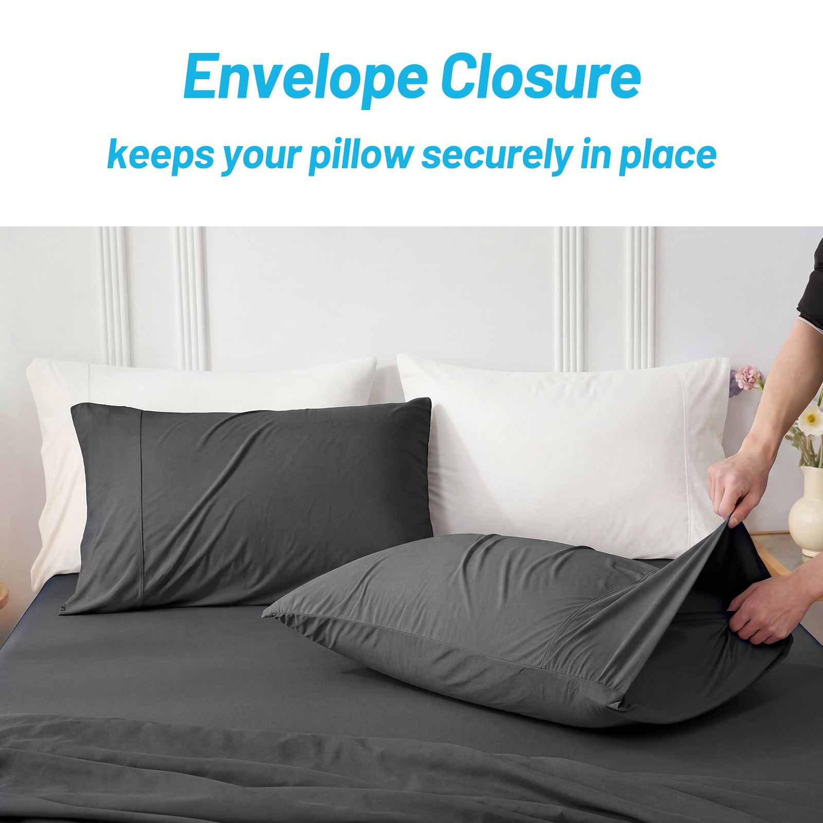 Person placing a gray pillowcase with envelope closure on a bed.#color_Charcoal Grey