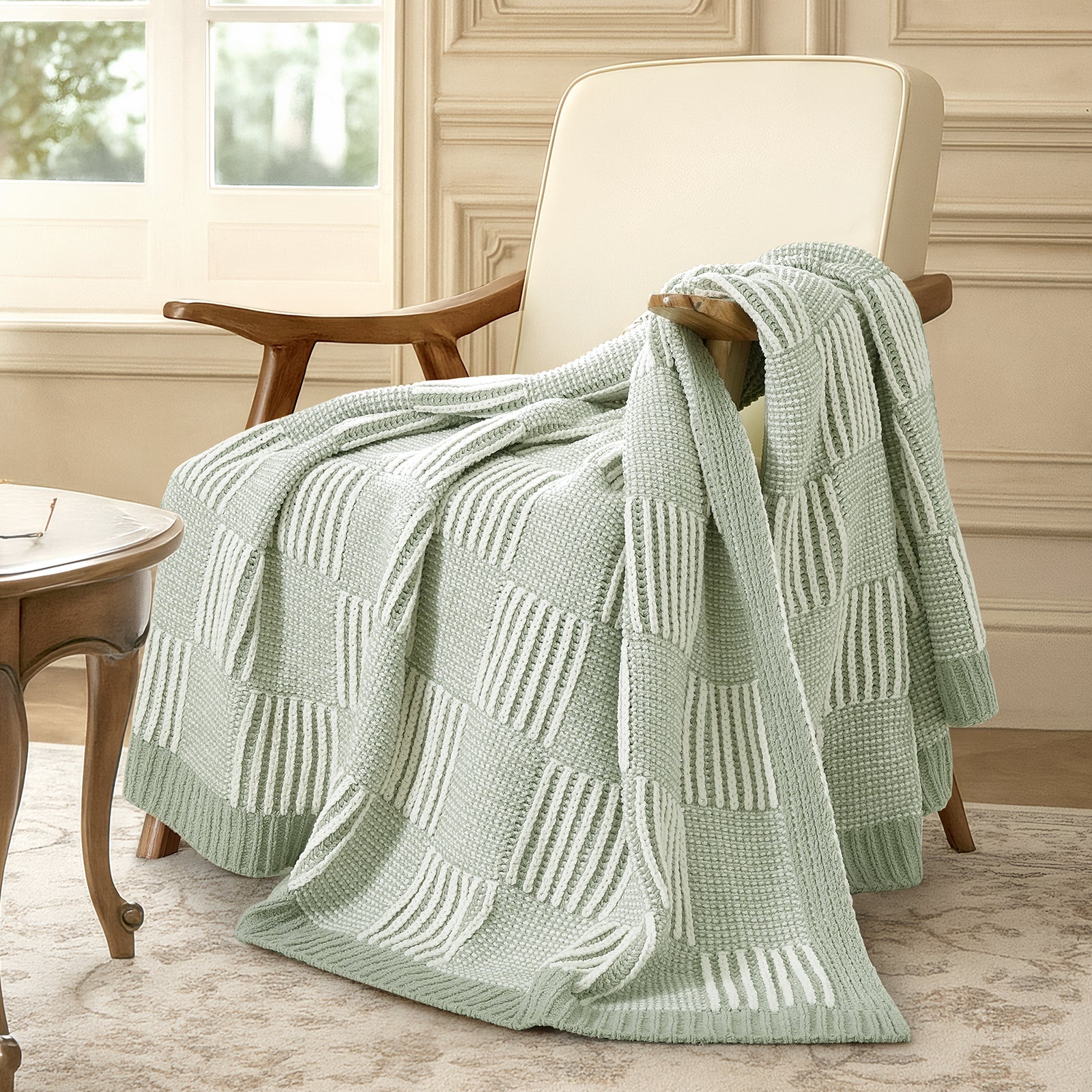 Snuggle Sac two tone checkered chenille knit throw blanket in Sage Green draped over a chair creating a cozy corner #color_Sage Green